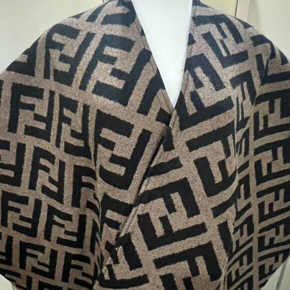 This is a Fendi shawl featuring the brand's iconic FF pattern. - Picture 2 of 8